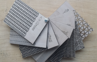 Fan of laser cut living hinge swatches